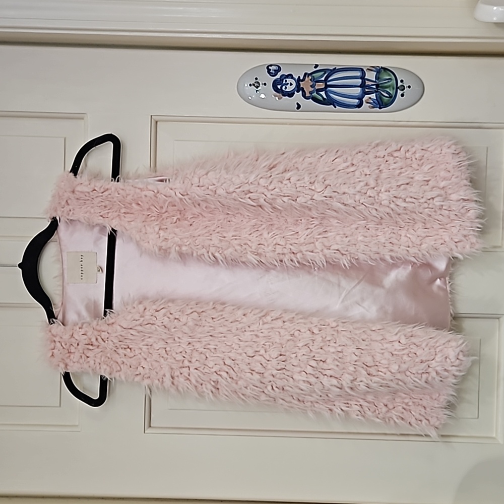 Copper key, size 10-12, youth fur vest, great condition